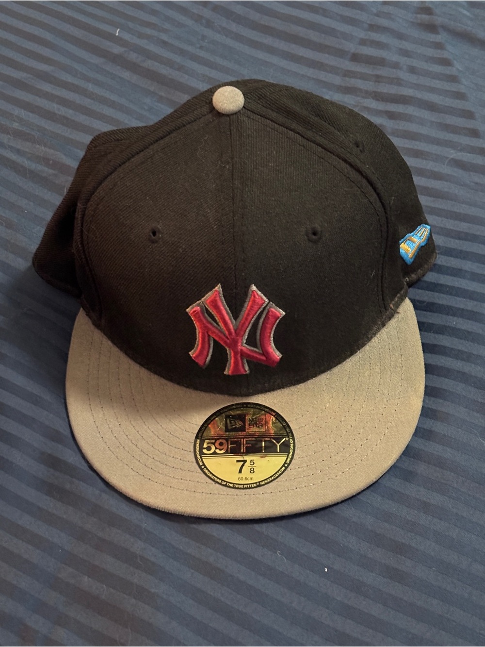 New Era 59FIFTY Black Crown with Burgundy Visor and NY Logo 7 5/8”